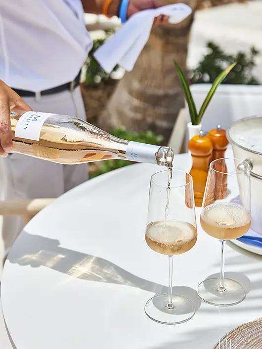 Rosé o'clock in the Fig Tree restaurant at The Potlatch Club Eleuthera