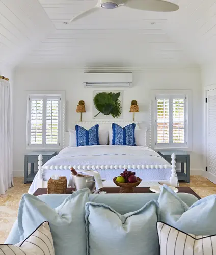 The Potlatch Club Eleuthera Ocean-front Cottage king-size wooden bed