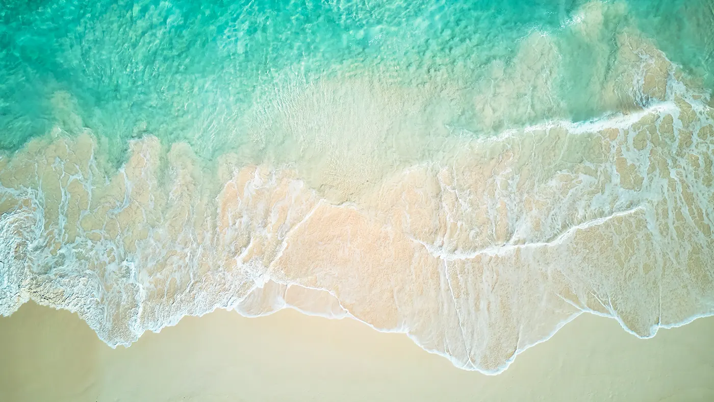 Pink sand, white surf and turquoise sea at The Potlatch Club, Eleuthera