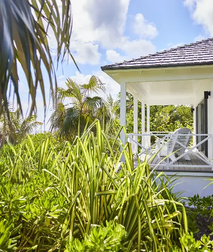 Garden-view Cottage veranda at The Potlatch Club, Eleuthera