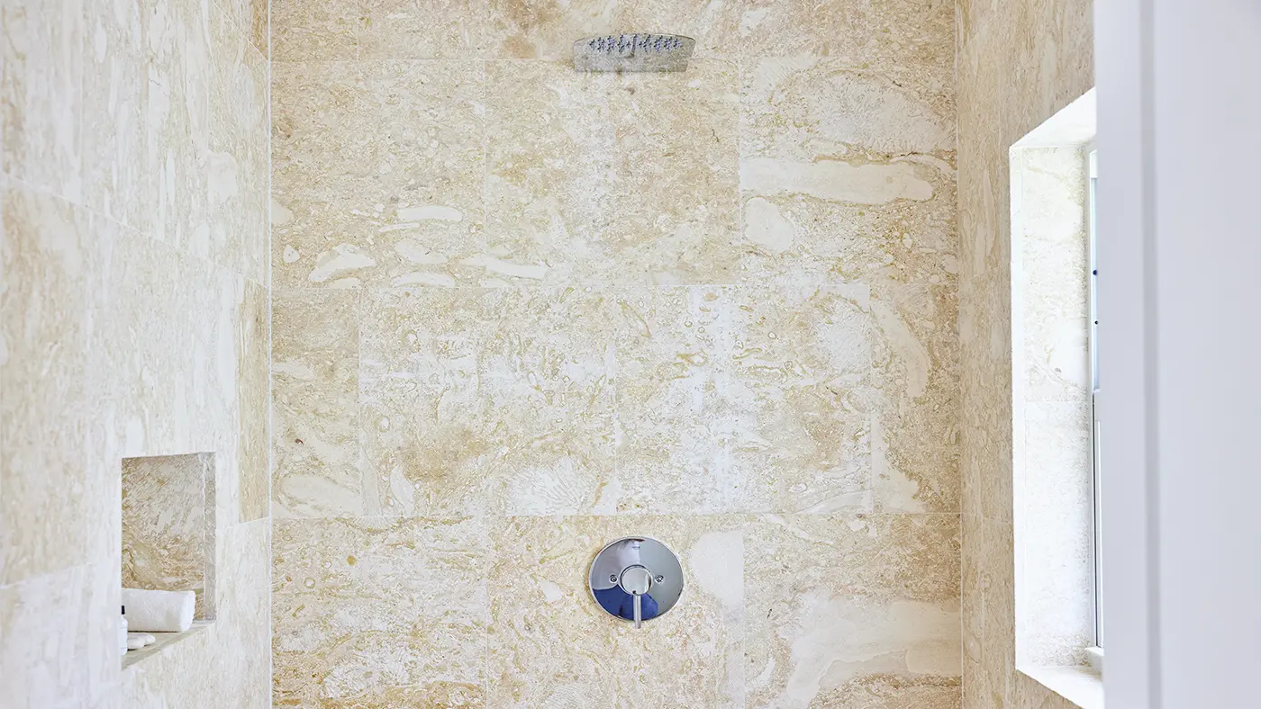 Marble shower in a Garden-view Cottage at The Potlatch Club, Eleuthera