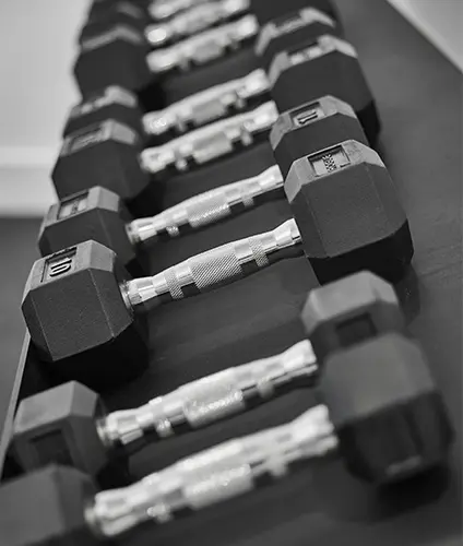 Dumbbells in the gym at The Potlatch Club Eleuthera